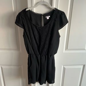 Black Xhilaration romper, size medium. 100% polyester.